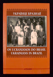 Orange book cover with a black and white photo of a group posing at a wedding.
